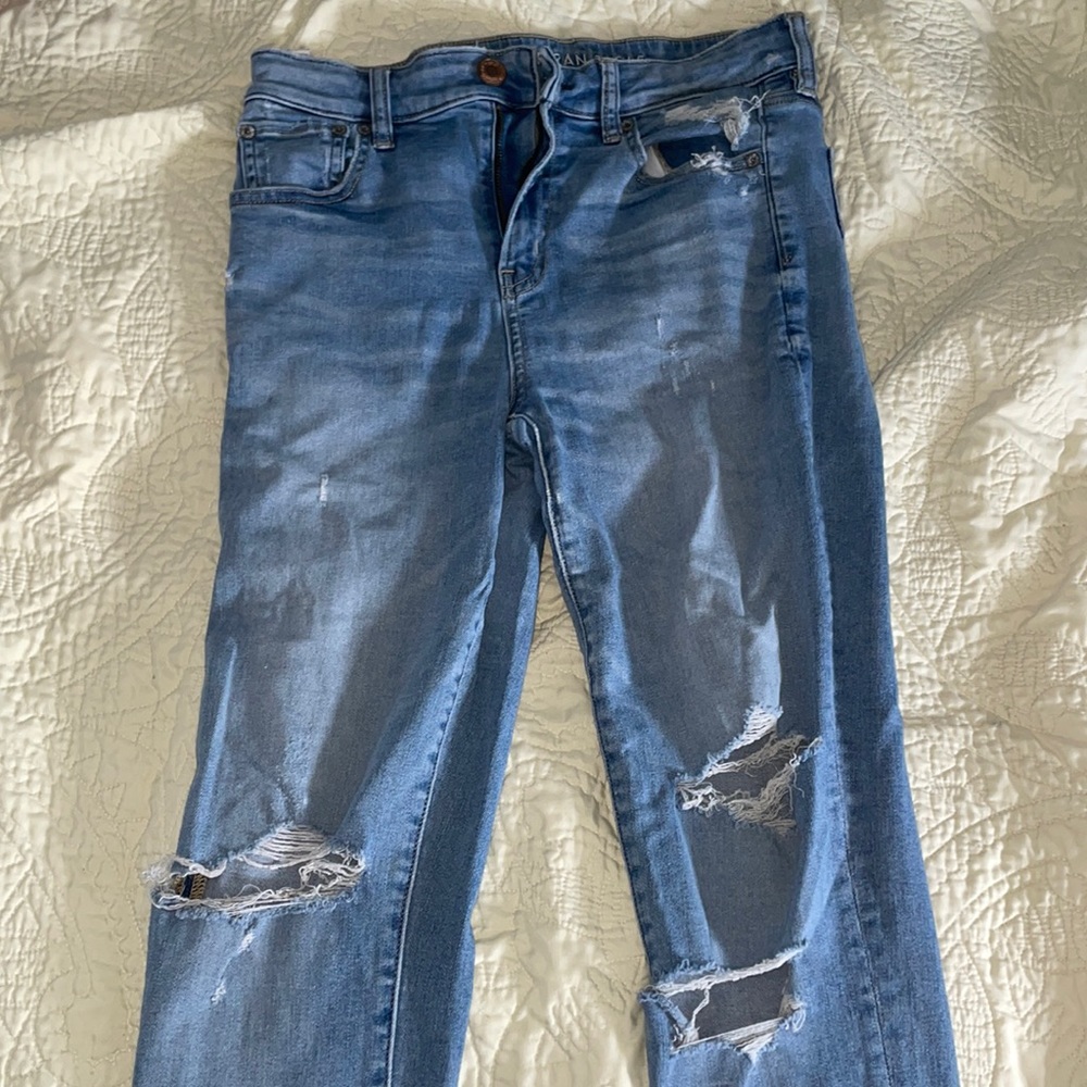 AMERICAN EAGLE next level stretch ripped jeans